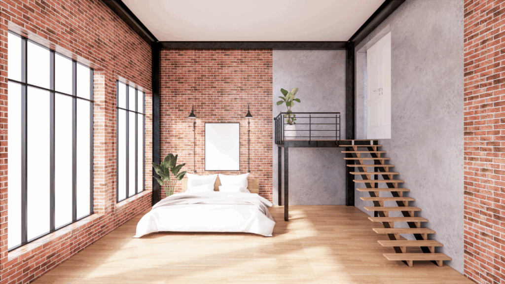 Styl wnętrz – sypialnia loftowa z ceglaną ścianą i antresolą